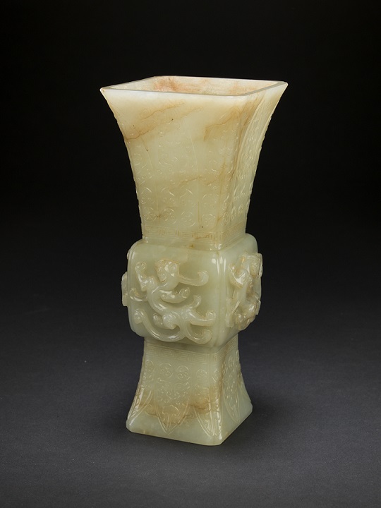 Jade gu vase with archaic dragon motif
