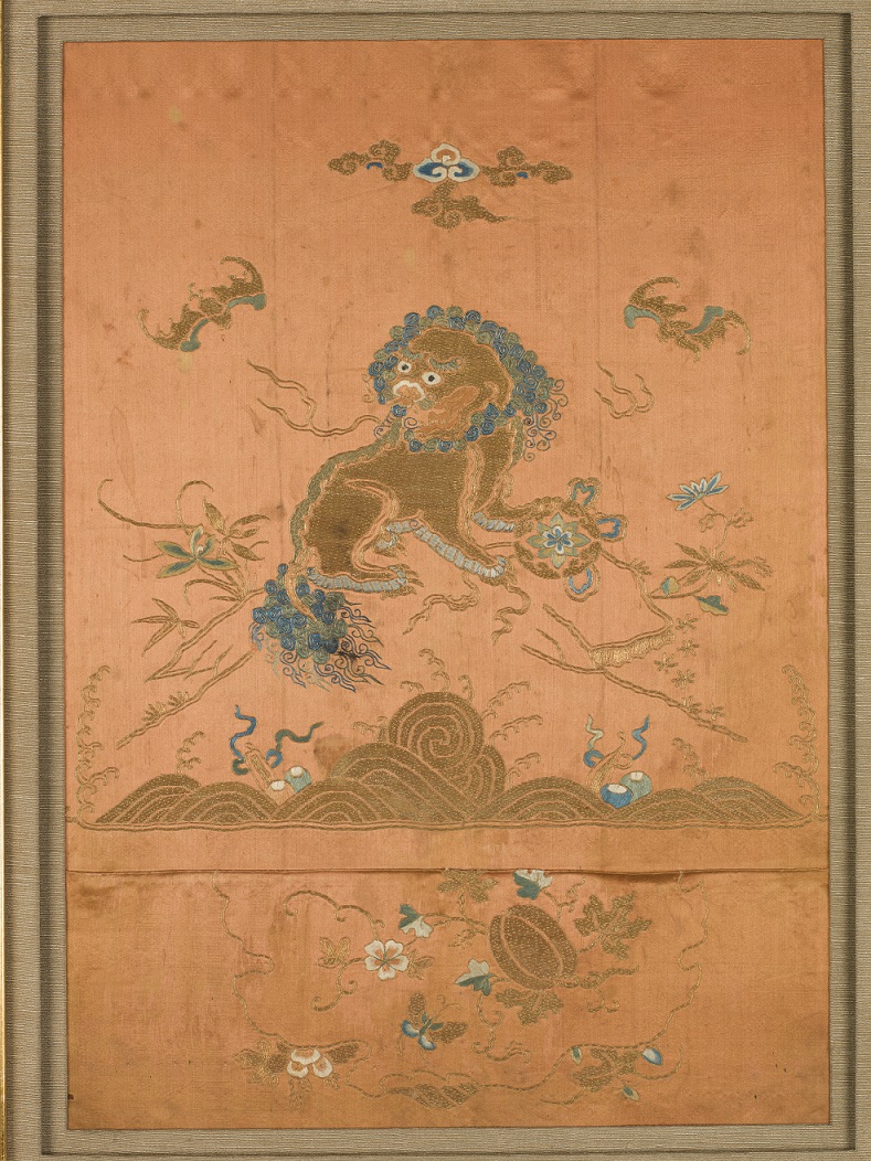Embroidered panel with lion and ball motif